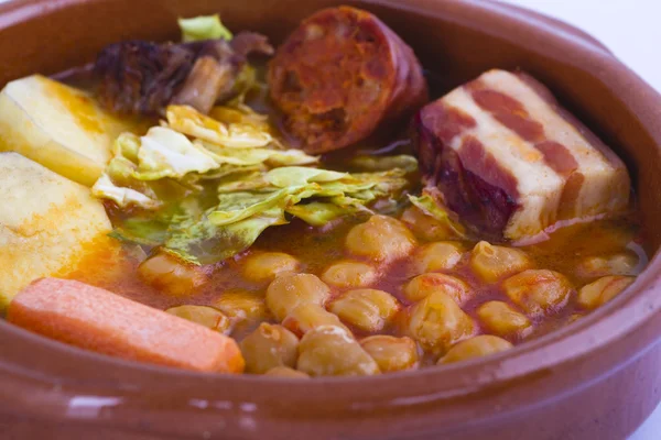 Madrid stew on earthenware pot — Stock Image Madrid stew on earthenware pot Royalty Free Stock Photos