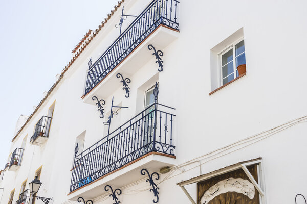 Traditional Andalusian streets with white houses in Marbella, Andalucia, Spain