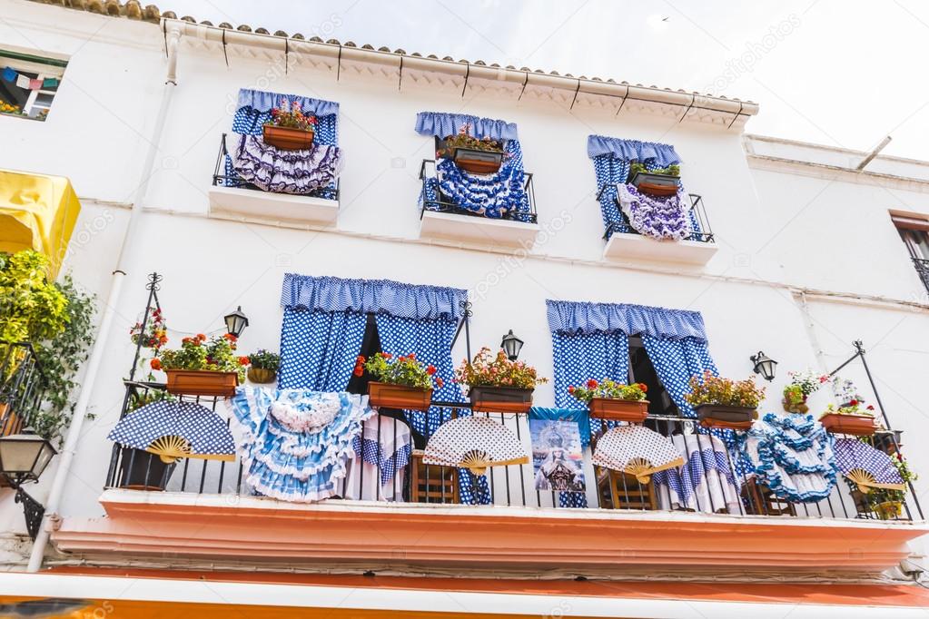 Balconies with flamenco dresses