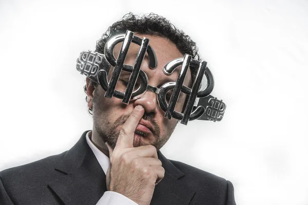 Homme d'affaires avec des lunettes en forme de dollar d'argent — Photo