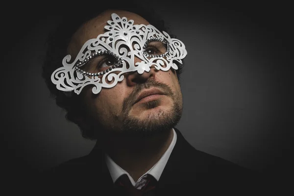 Man wearing mysterious Venetian mask — Stock Photo, Image