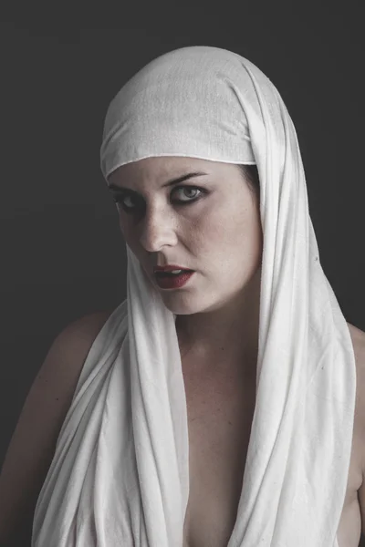 Woman with a white towel on her head — Stock Photo, Image