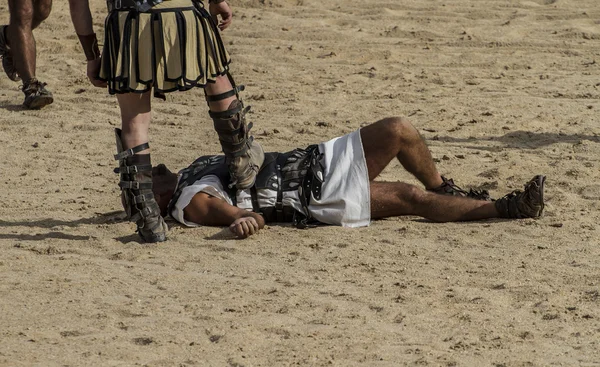 Gladiators fighting on the arena