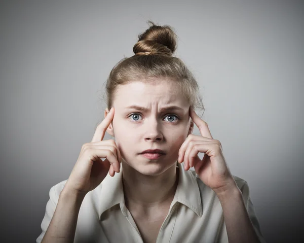 Worried girl in white — Stock Photo, Image