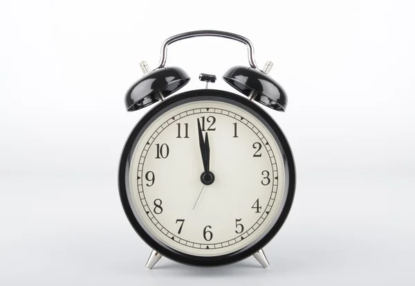 Två minuter till klockan tolv. Alarm clock. — Stockfoto