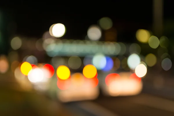 Defocused urban abstract texture, bokeh lights of city lights in — Stock Photo, Image