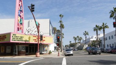 Star theatre, pacific coast highway 1, historic route 101. Palm trees on street road, California USA clipart