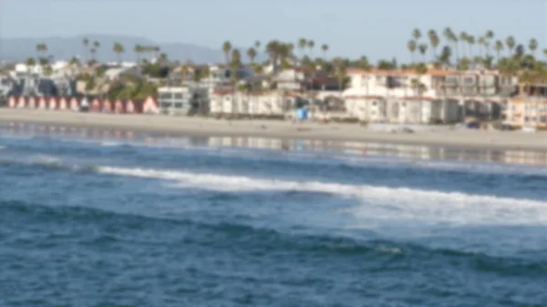 Pacific ocean coast from pier. Sea wave. Beachfront vacation. California USA. Palm tree and cottages — Stock Photo, Image