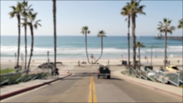 Road to ocean beach California USA. Summertime palm trees. Summer coast near Los Angeles. Sea waves. — Stock Video