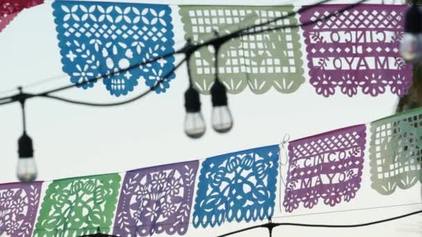 Mexican perforated papel picado banner, festival flags, paper tissue garland. — Stock Video