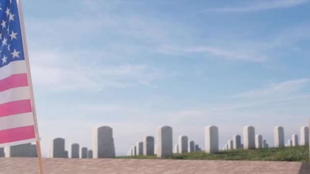 Tombstones and american flag, national military memorial cemetery in USA. — Stock Video