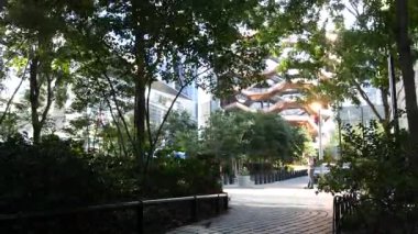 New York City, ABD - 1 Eylül 2023: Hudson Yards Vessel, şehir mimarisi Chelsea, Manhattan 34. Cadde, ABD. Yeni modern cam gökdelenler, Amerikan iş binaları, gayrimenkul.