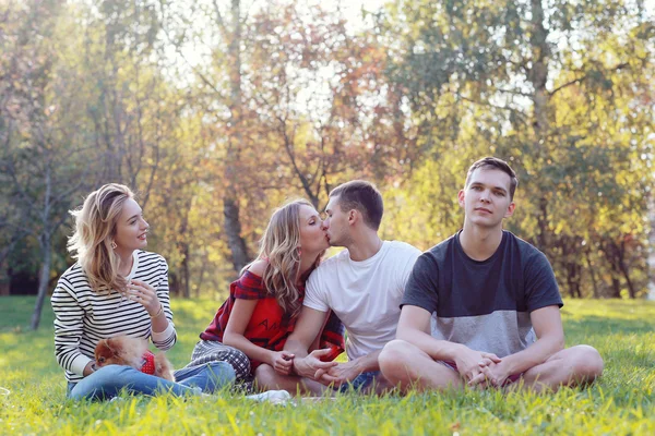 Young people in autumn picnic — Stock Photo, Image