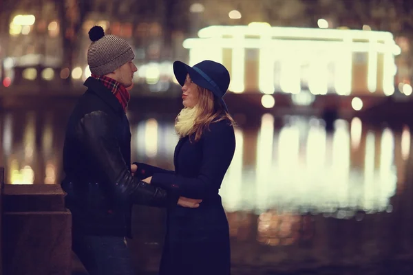Attractive couple walking in city — Stock Photo, Image