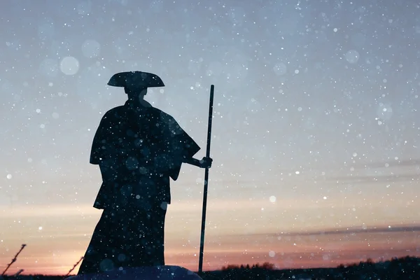 Samurai in winter field — Stock Photo, Image