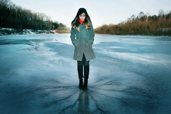 Young Girl standing on ice — Stock Photo, Image