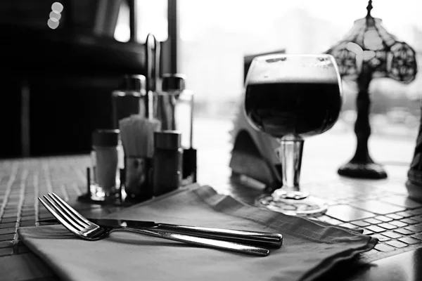 Wine glass on table in restaurant — Stok Foto