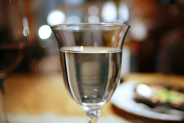 Glass of water on table — Stock Photo, Image