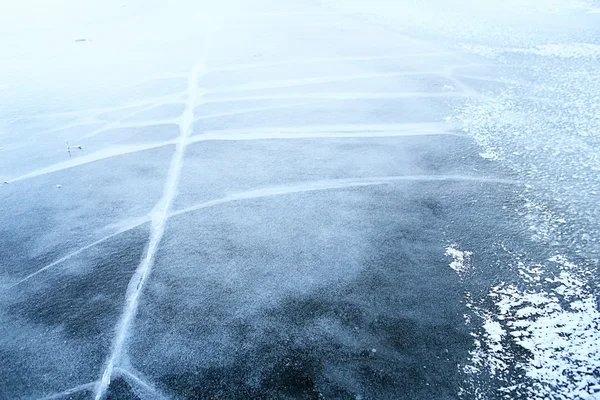 Cracked frozen lake — Stock Photo, Image