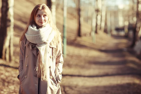 Portrait of a happy woman in coat — Stock Photo, Image