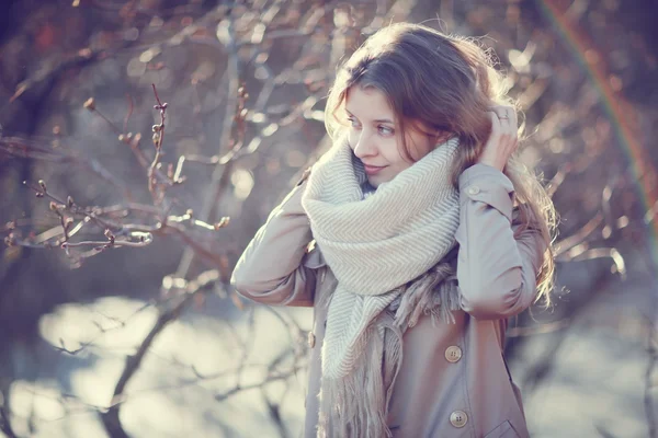 Portrait of a girl in a coat in city — Stock Photo, Image