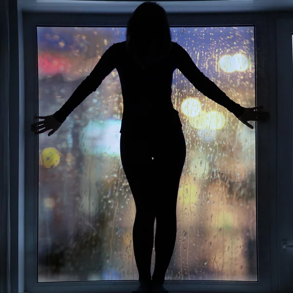 Silhouette of girl doing fitness — Stock Photo, Image