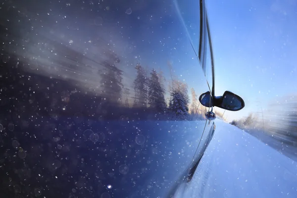 Winter road and car window — Stock Photo, Image