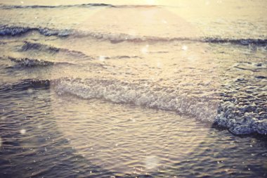 denizin üzerinde arka plan günbatımı