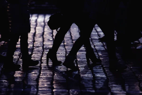 Mensen benen silhouetten — Stockfoto