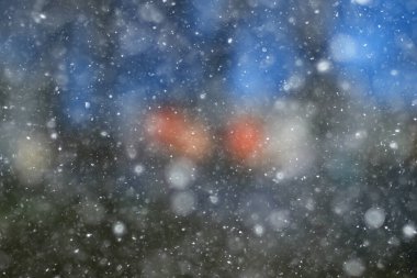 Renkli arka plan kar yağışı akşam ışıkları, yumuşak ışık bulanıklığı