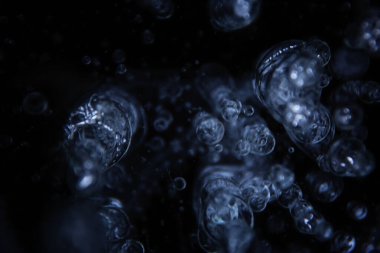 Buz kabarcıkları altında hava, soyut mevsimsel kış soğuk arka plan doğa dışında