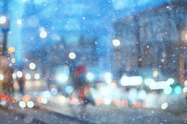 Soyut kar arka planda bulanık şehir ışıkları, kış tatili yeni yıl