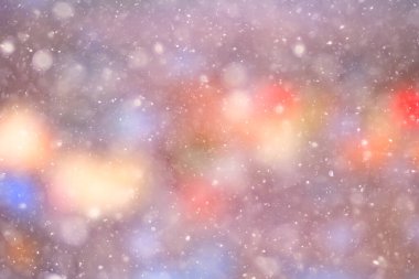 Renkli arka plan kar yağışı akşam ışıkları, yumuşak ışık bulanıklığı