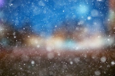 Renkli arka plan kar yağışı akşam ışıkları, yumuşak ışık bulanıklığı