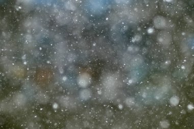 Renkli arka plan kar yağışı akşam ışıkları, yumuşak ışık bulanıklığı