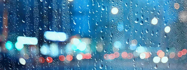 Mokre Okno Miasto Światła Deszcz Krople Abstrakcyjne Tło Jesień Zima — Zdjęcie stockowe