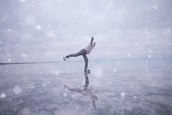 one guy skates on the ice of a frozen lake, nature landscape, man outdoor sports