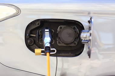 Elektrikli otomobil yakıt ikmali, teknoloji yeşil ulaşım enerji kavramı