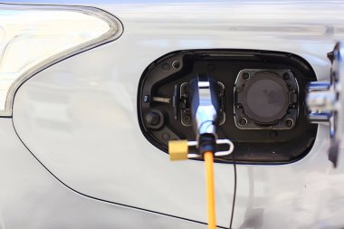 Elektrikli otomobil yakıt ikmali, teknoloji yeşil ulaşım enerji kavramı