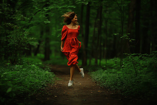 Freedom girl spring forest, nature beautiful female in the park