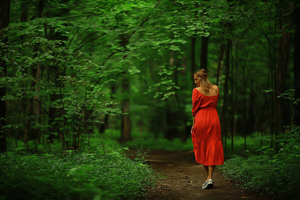 Freedom girl spring forest, nature beautiful female in the park