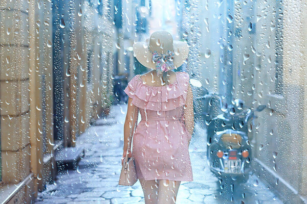 Rain female in dress europe summer rainy day young woman tourism mediterranean