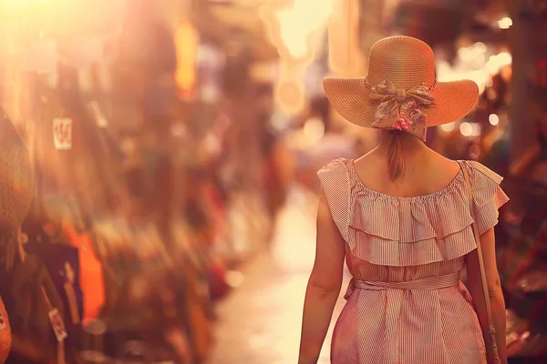 tourism summer old town female, europe mediterranean, young woman traveler, back straw hat view