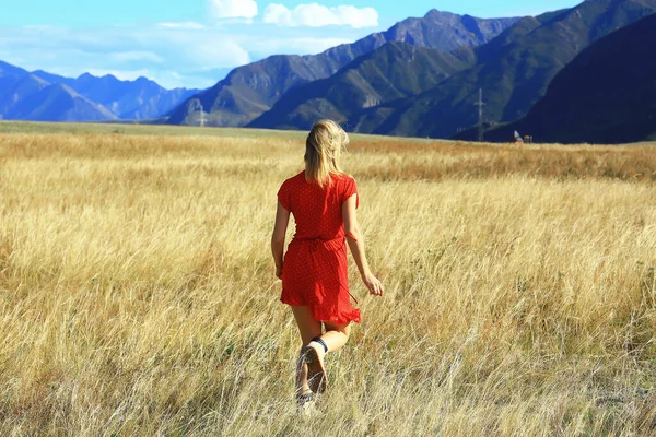 girl in the field mountains dress freedom, eco friendly, summer landscape active rest