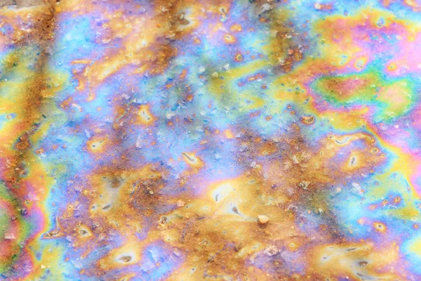 外溢的汽油彩虹背景 工业品泄漏污染 抽象纹理五彩斑斓 — 图库照片