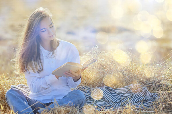 summer sunny portrait of a happy girl, female happiness sun glare straw field country style