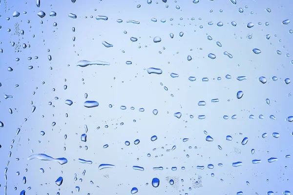 ガラスの青の背景の抽象的で透明度の高い冷たい背景の水が — ストック写真