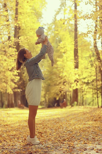 Mom Holding Baby Her Arms Autumn Park Outdoor Family Background — Stock Photo, Image