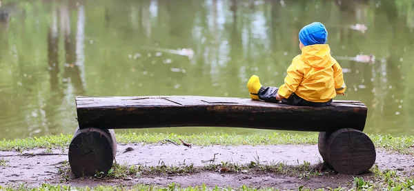 kid park raincoat yellow, fun seasonal wet waterproof outdoor clothing