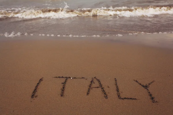 Italy inscription on sand — Stock Photo, Image